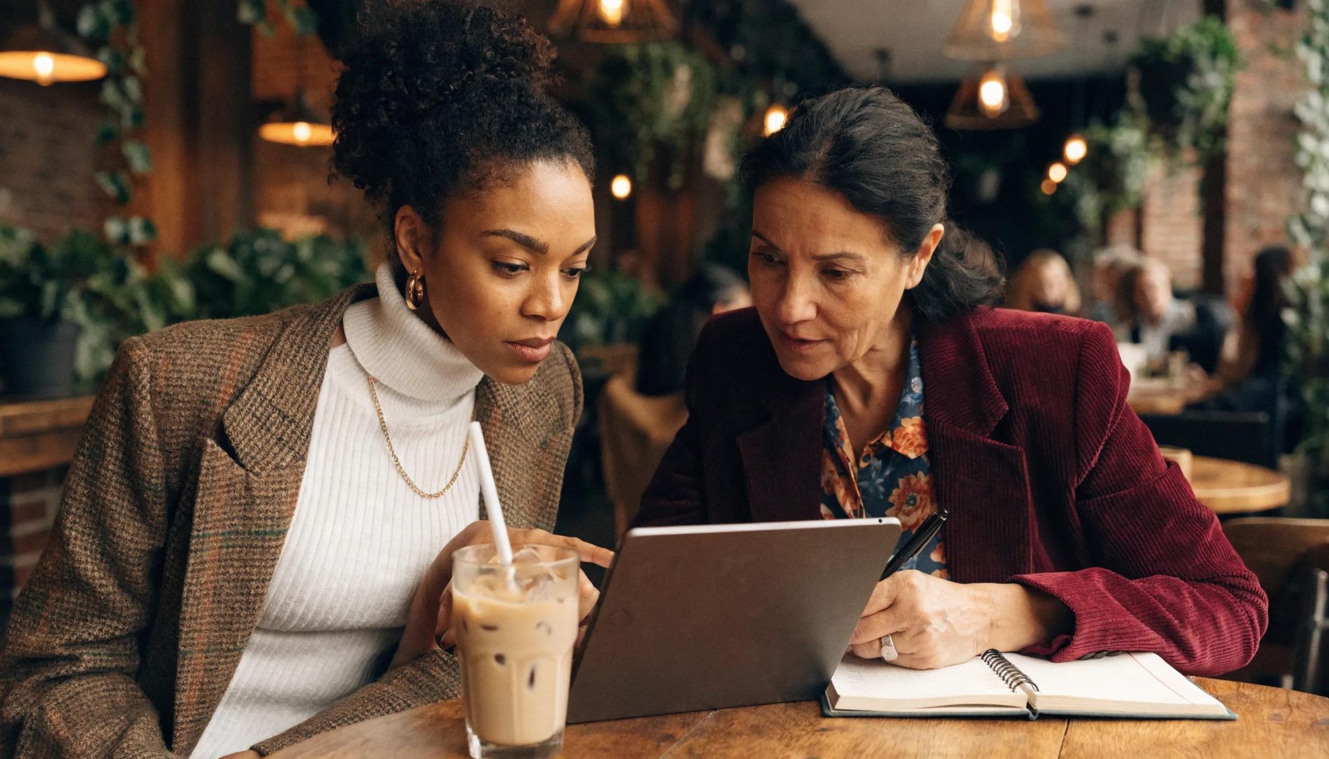 Commercial finance broker providing personalized support to a small business owner in a café